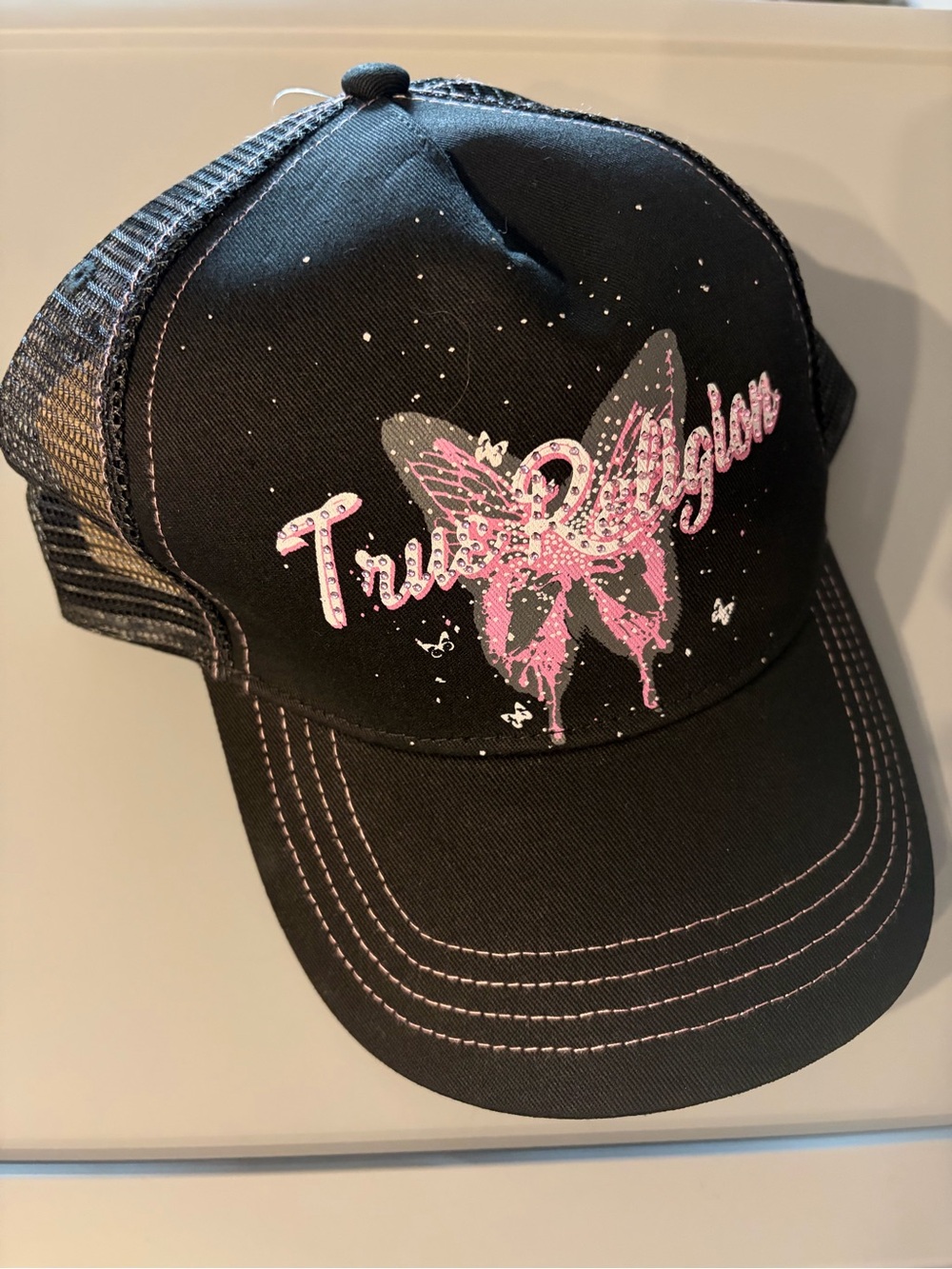 True Religion Black Trucker Hat with Pink Butterfly Accent